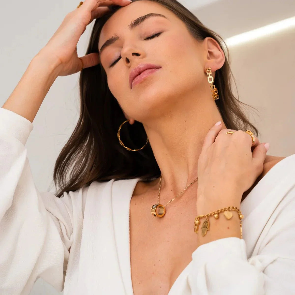 Collar Giratório Numeral Romanos Bañado en Oro 18K