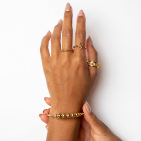 Brazalete Anti-stress Ajustable Esferas Bañado en Oro 18K